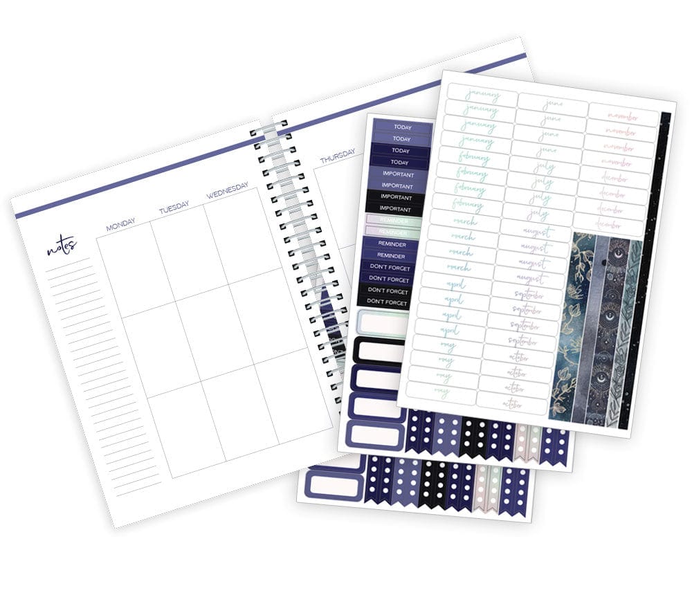 Interior spread showing metallic celestial planner tab dividers